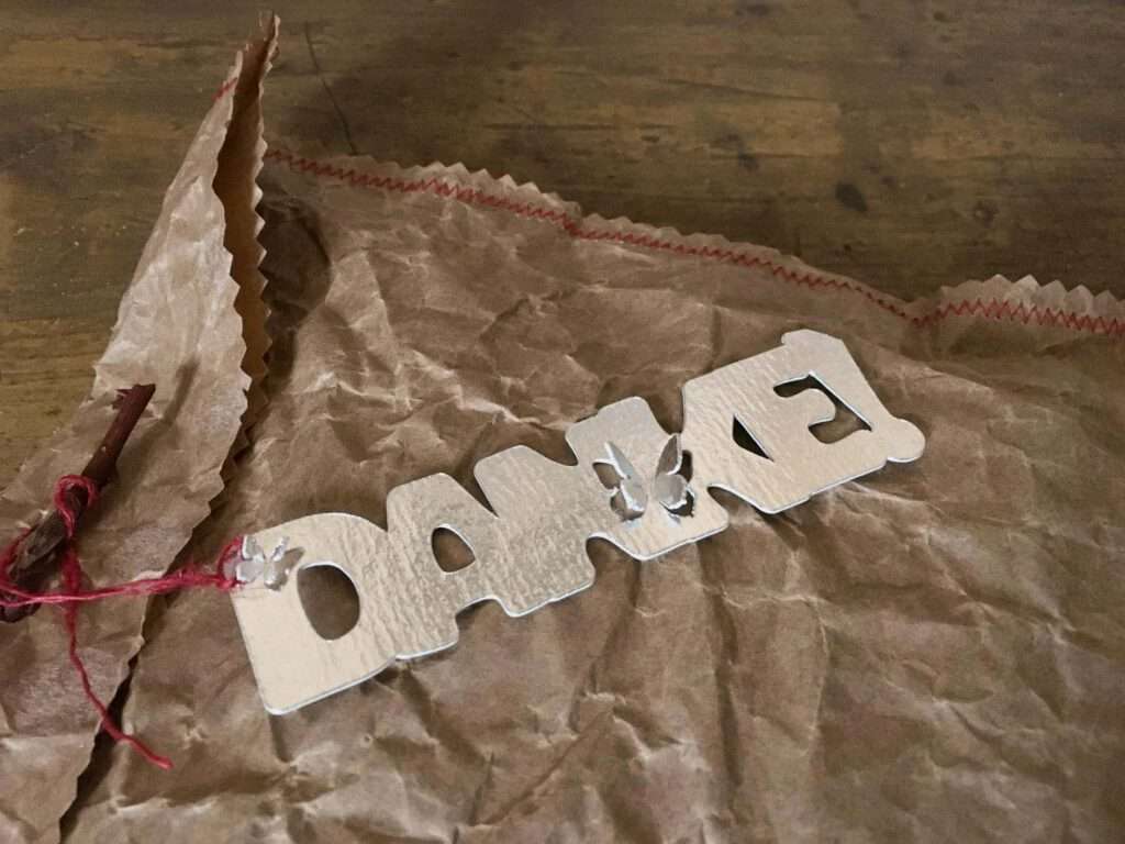 Schriftzug "Danke" mit 3D Schmettellinge