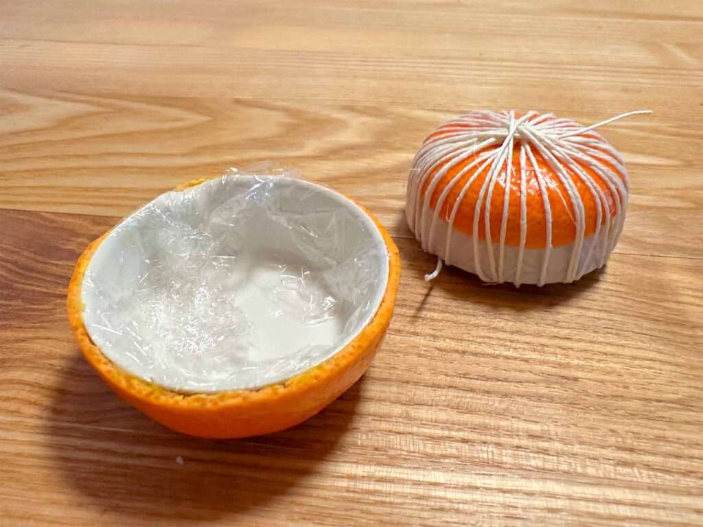 Mein Experiment mit Teelichtern aus Zitrusschalen