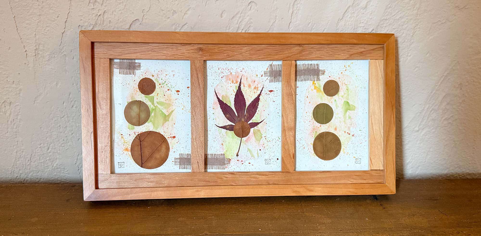 Naturmaterialien kreativ nutzen: Mit konservierten Herbstblättern entstehen Wandbilder