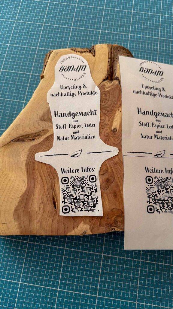 Entwurf für Gartenschild aus Holzquerschnitt mit Lasergravur und Naturmaterialien